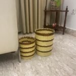 Image displaying a set of beige and brown dustbins and wastebaskets in varying sizes, arranged to highlight their functionality and subtle, earthy color palette—ideal for both small and large waste disposal needs