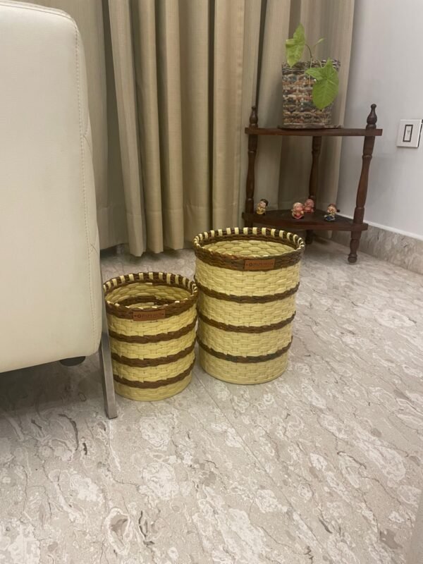Image displaying a set of beige and brown dustbins and wastebaskets in varying sizes, arranged to highlight their functionality and subtle, earthy color palette—ideal for both small and large waste disposal needs